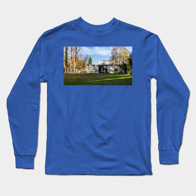 Old abandoned building in a park surrounded by nature and sunlight Long Sleeve T-Shirt by KargacinArt